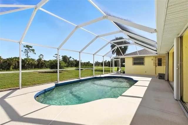 a view of a house with a swimming pool