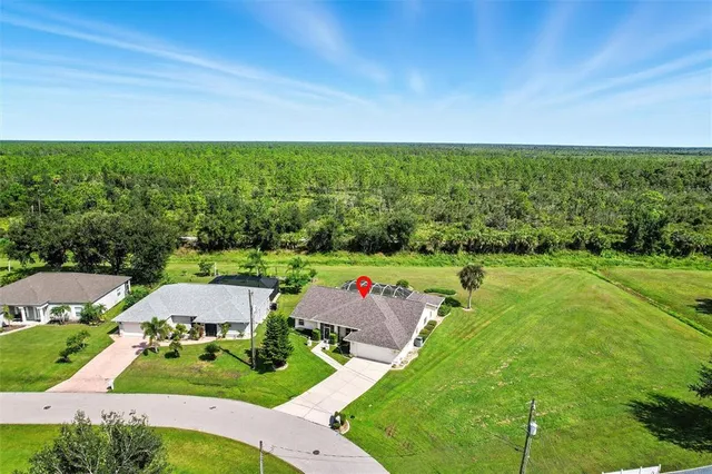 a aerial view of a house with garden