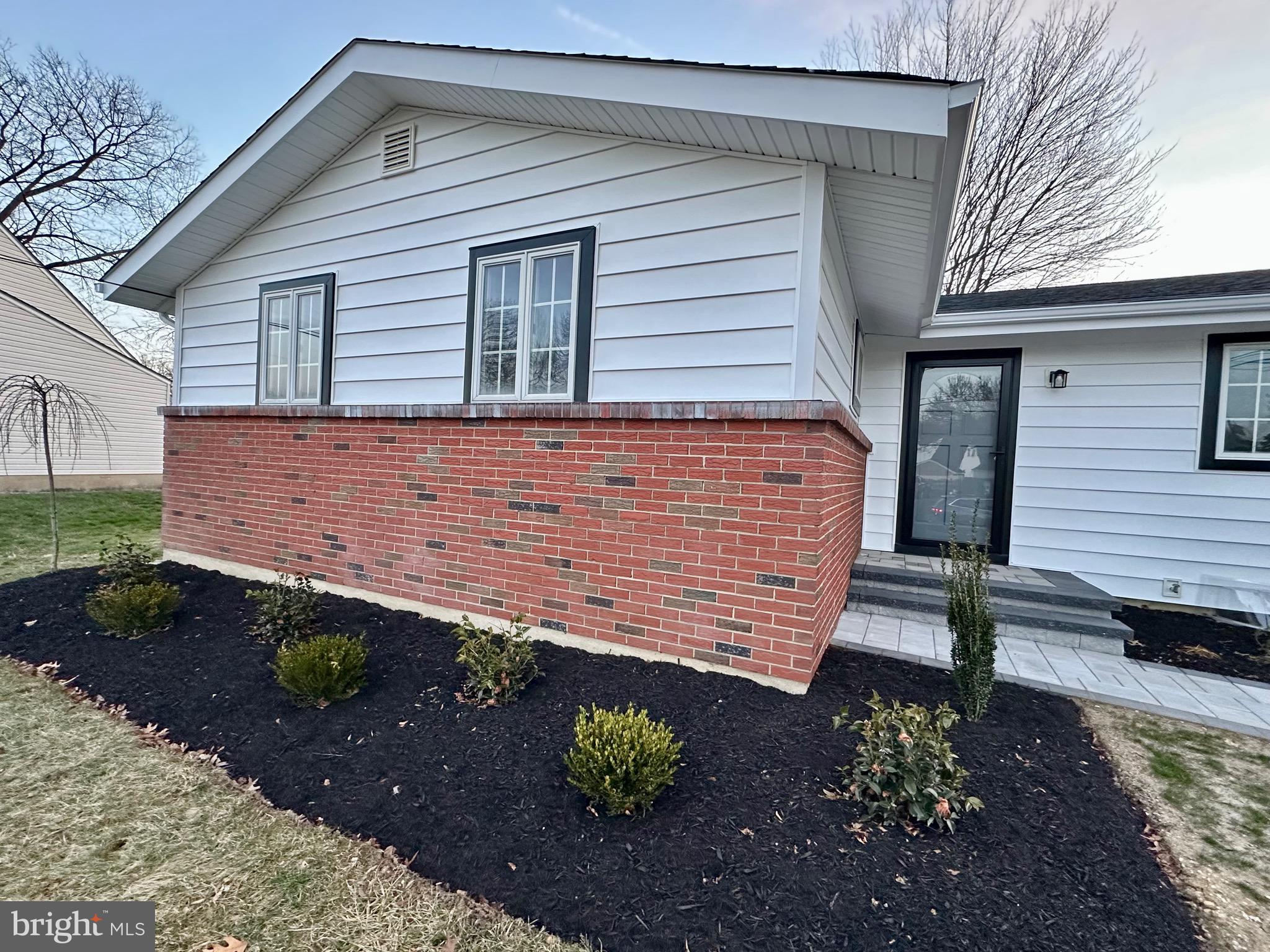 21 Rolling Lane Hamilton, NJ 08690 - Photo 5 of 40 a view of a house with a yard