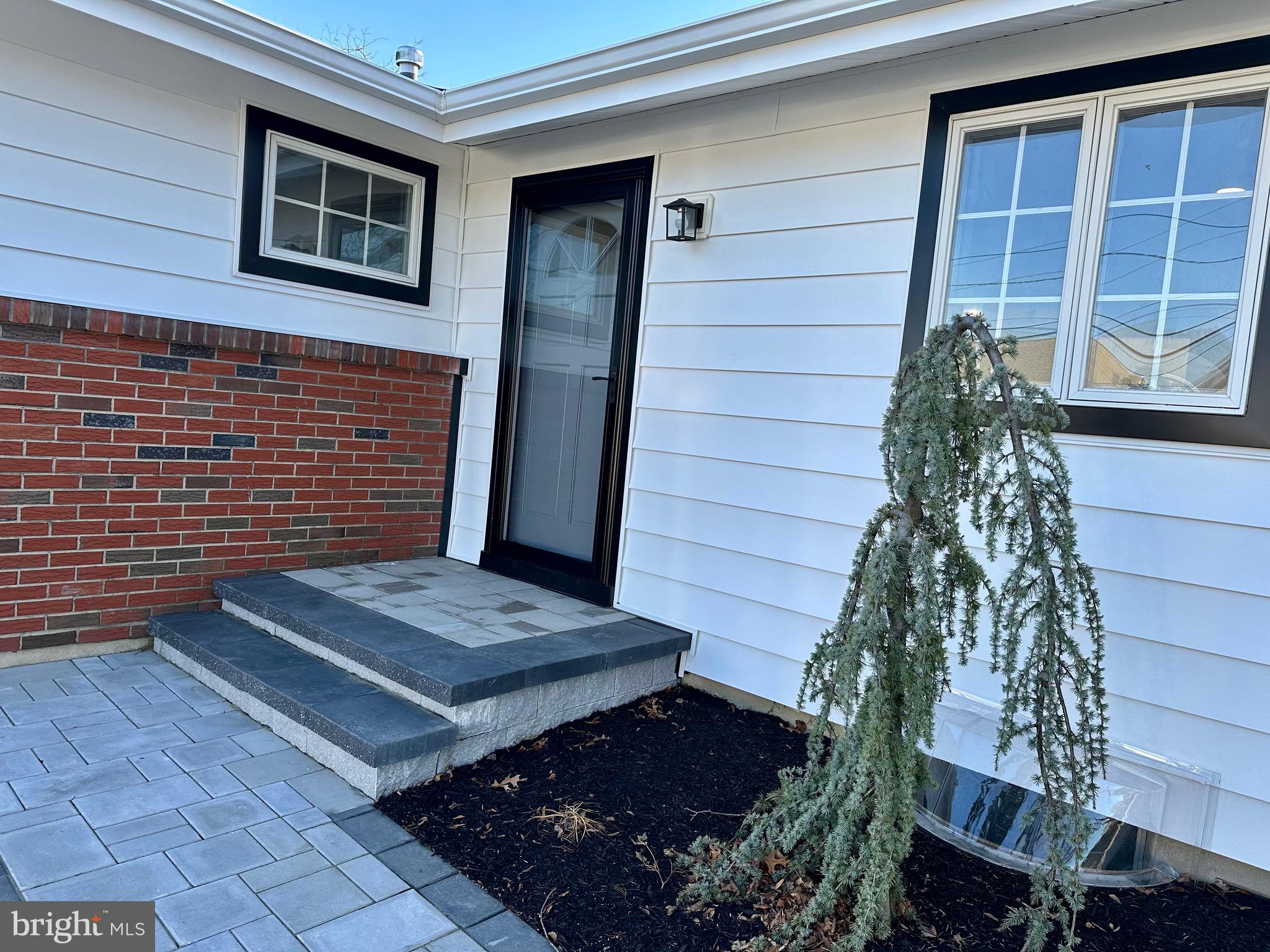 21 Rolling Lane Hamilton, NJ 08690 - Photo 7 of 40 a view of front door of house