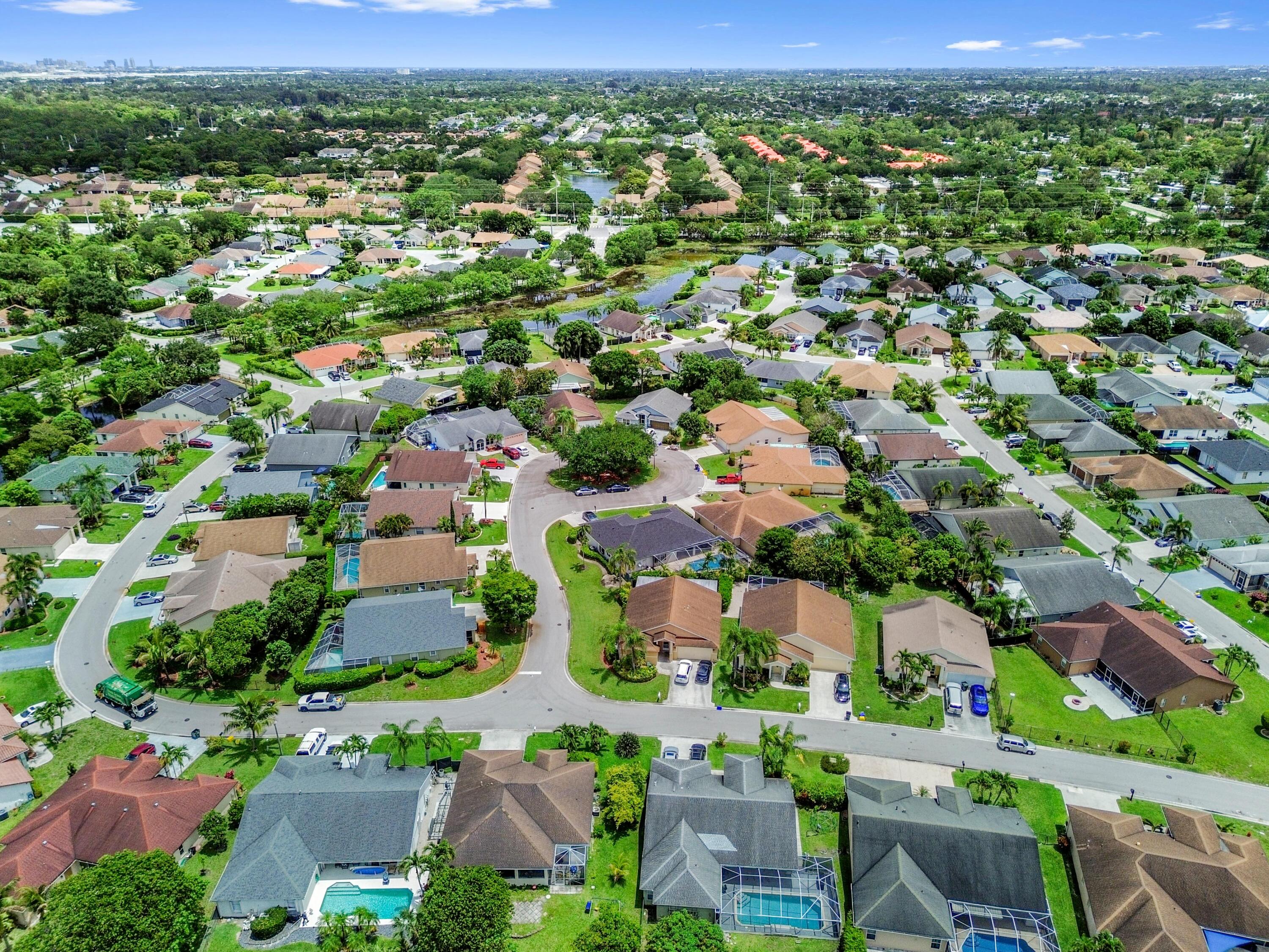 1163 Peninsula Way Greenacres, FL 33413 - Photo 35 of 40 40 drone 07