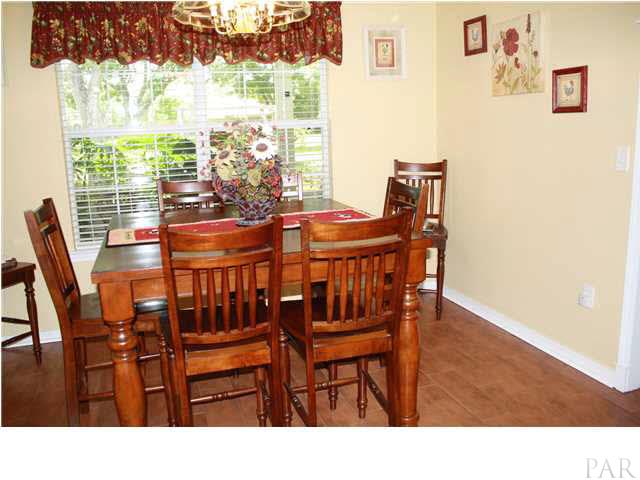 2387 Tuttle Road Cantonment, FL 32533 - Photo 13 of 25 BIG BREAKFAST NOOK OVERLOOKS THE BIG BACK YARD