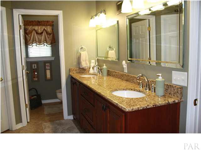 2387 Tuttle Road Cantonment, FL 32533 - Photo 16 of 25 GRANITE COUNTER TOPS WATER CLOSET HIS AND HERS WALK IN CLOSETS
