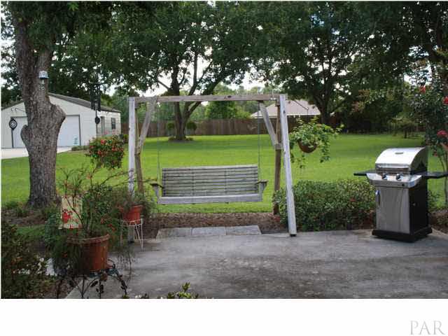 2387 Tuttle Road Cantonment, FL 32533 - Photo 25 of 25 OPEN PATIO FOR GRILLING AND CHILLING