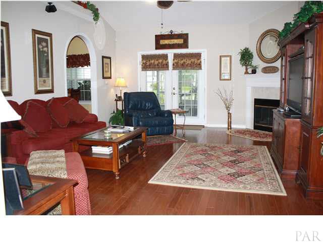 2387 Tuttle Road Cantonment, FL 32533 - Photo 5 of 25 SPACIOUS GREAT ROOM WITH ELECTRIC FIREPLACE