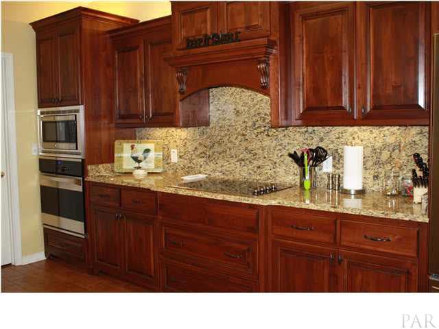 2387 Tuttle Road Cantonment, FL 32533 - Photo 10 of 25 HANDSOME GRANITE COUNTERTOPS AND STAINLESS STEEL APPLIANCES