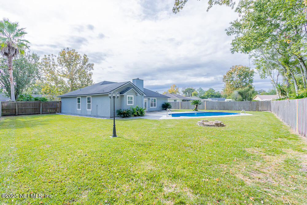 2168 Minorcan Street Middleburg, FL 32068 - Photo 23 of 24 a house view with swimming pool in front of it