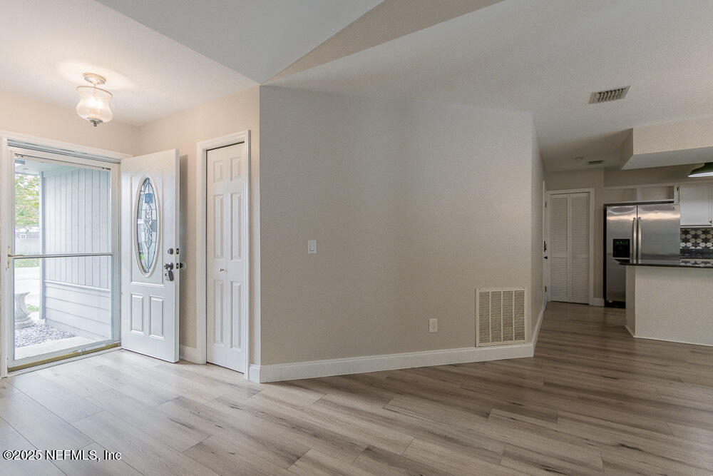 2168 Minorcan Street Middleburg, FL 32068 - Photo 4 of 24 a view of a kitchen with a sink and refrigerator