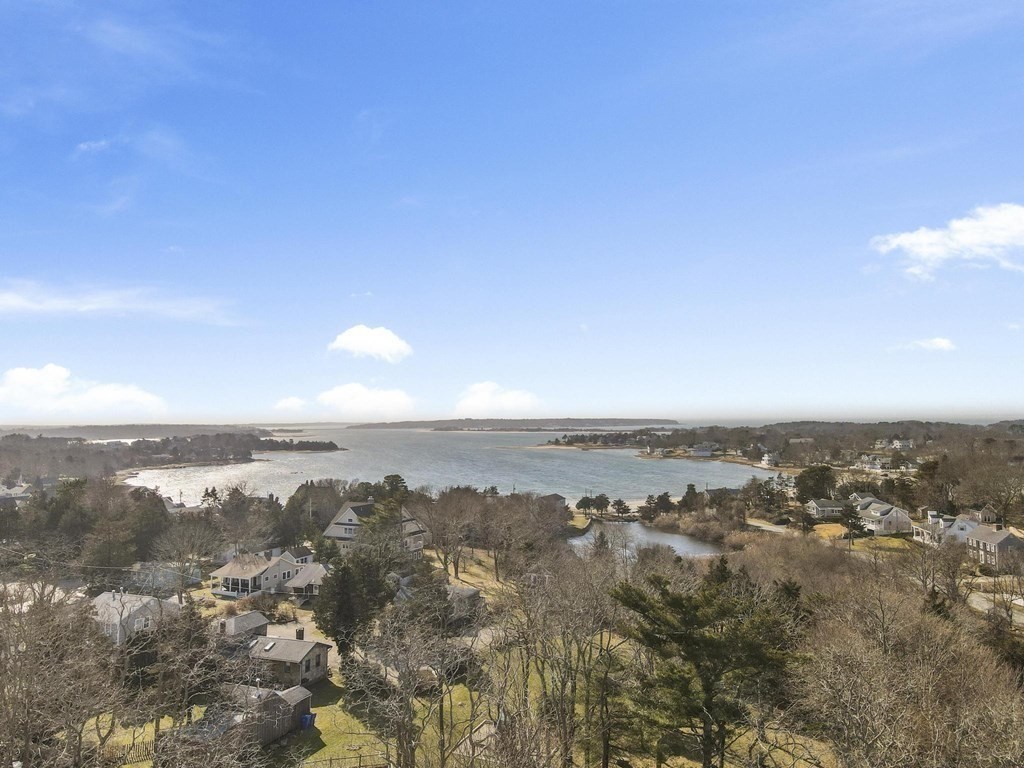 928 Shore Road Bourne, MA 02559 - Photo 8 of 32 an aerial view of multiple house