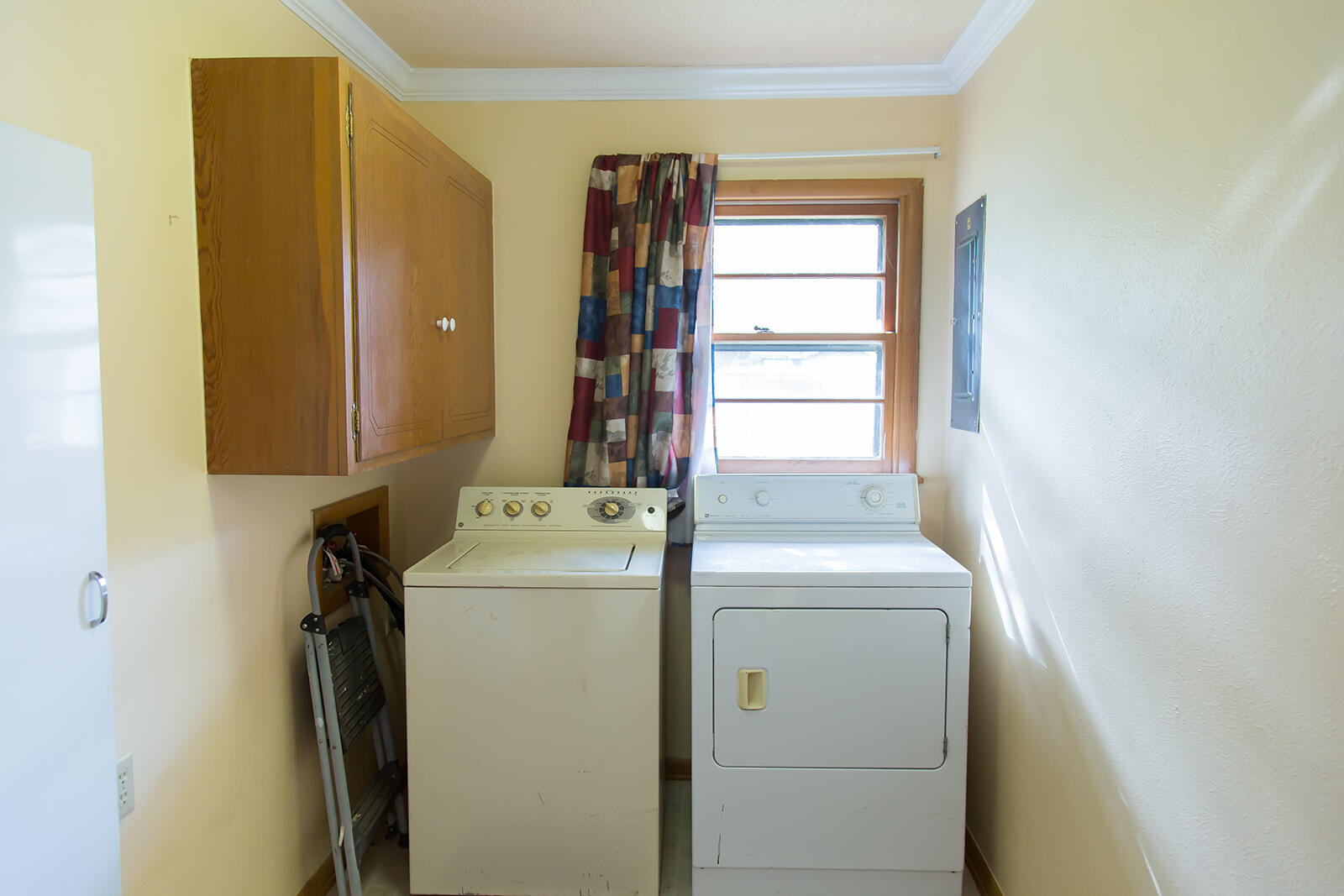 1107 Ennis Street Plainview, TX 79072 - Photo 18 of 42 a utility room with dryer and washer