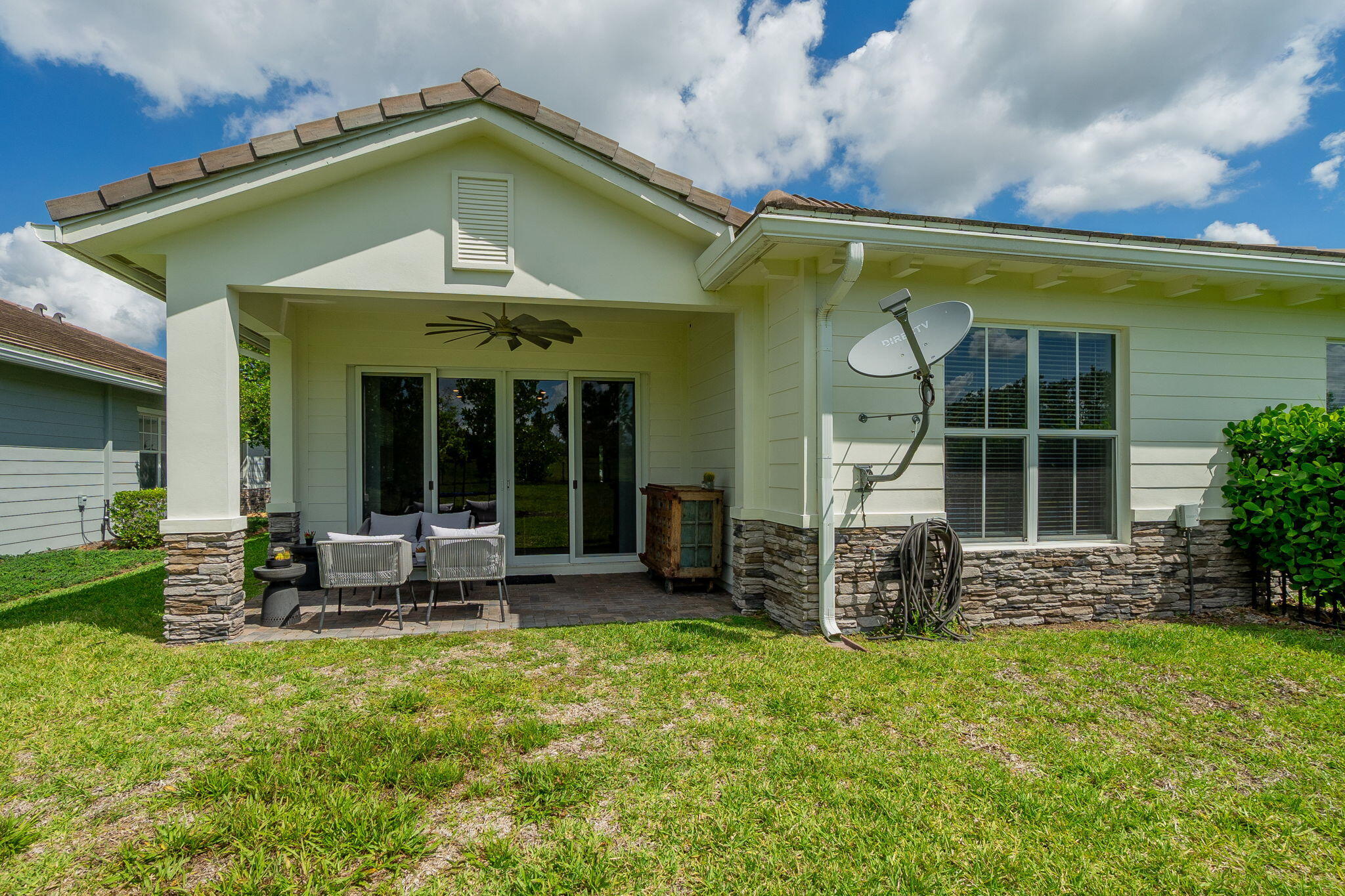 19546 Weathervane Way Loxahatchee, FL 33470 - Photo 34 of 63 a front view of a house with garden