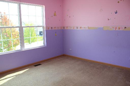 1319 Roth Drive Joliet, IL 60431 - Photo 5 of 10 a view of a room with window