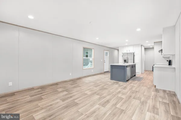 a large white room with a large window