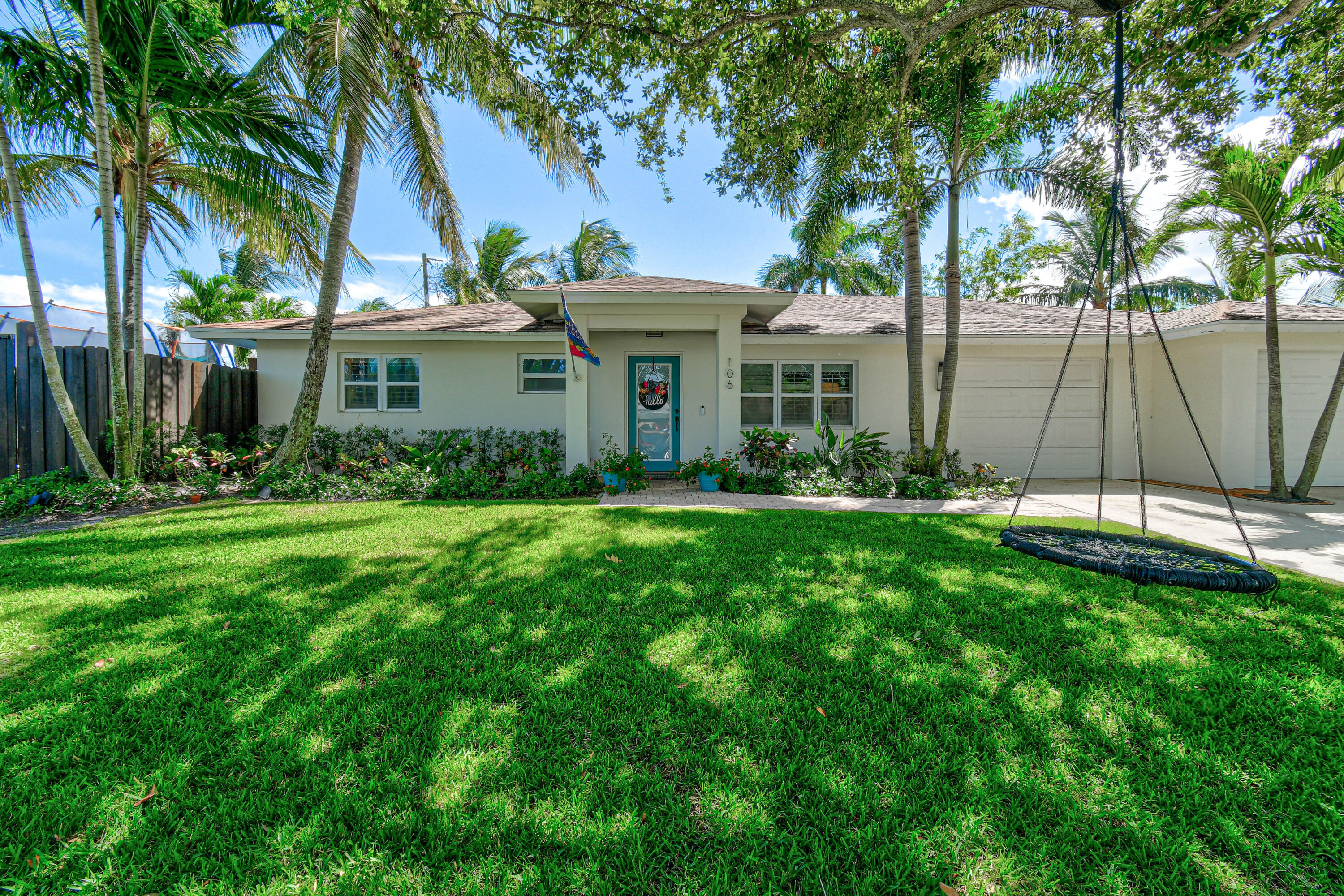 106 Windsor Road East Jupiter, FL 33469 - Photo 6 of 44 Exterior Front