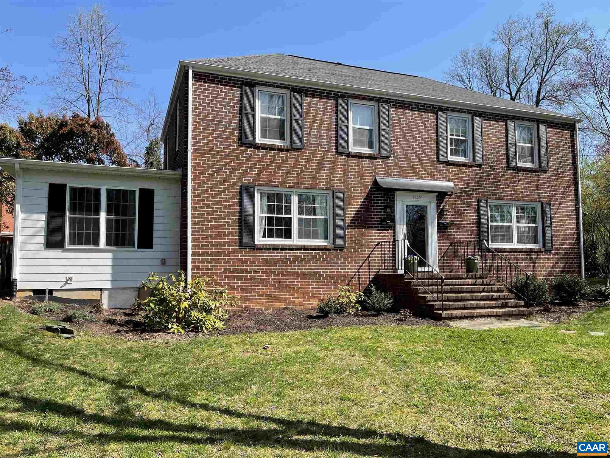 1953 Thomson Road Charlottesville, VA 22903 - Photo 1 of 7 a front view of a house with a yard
