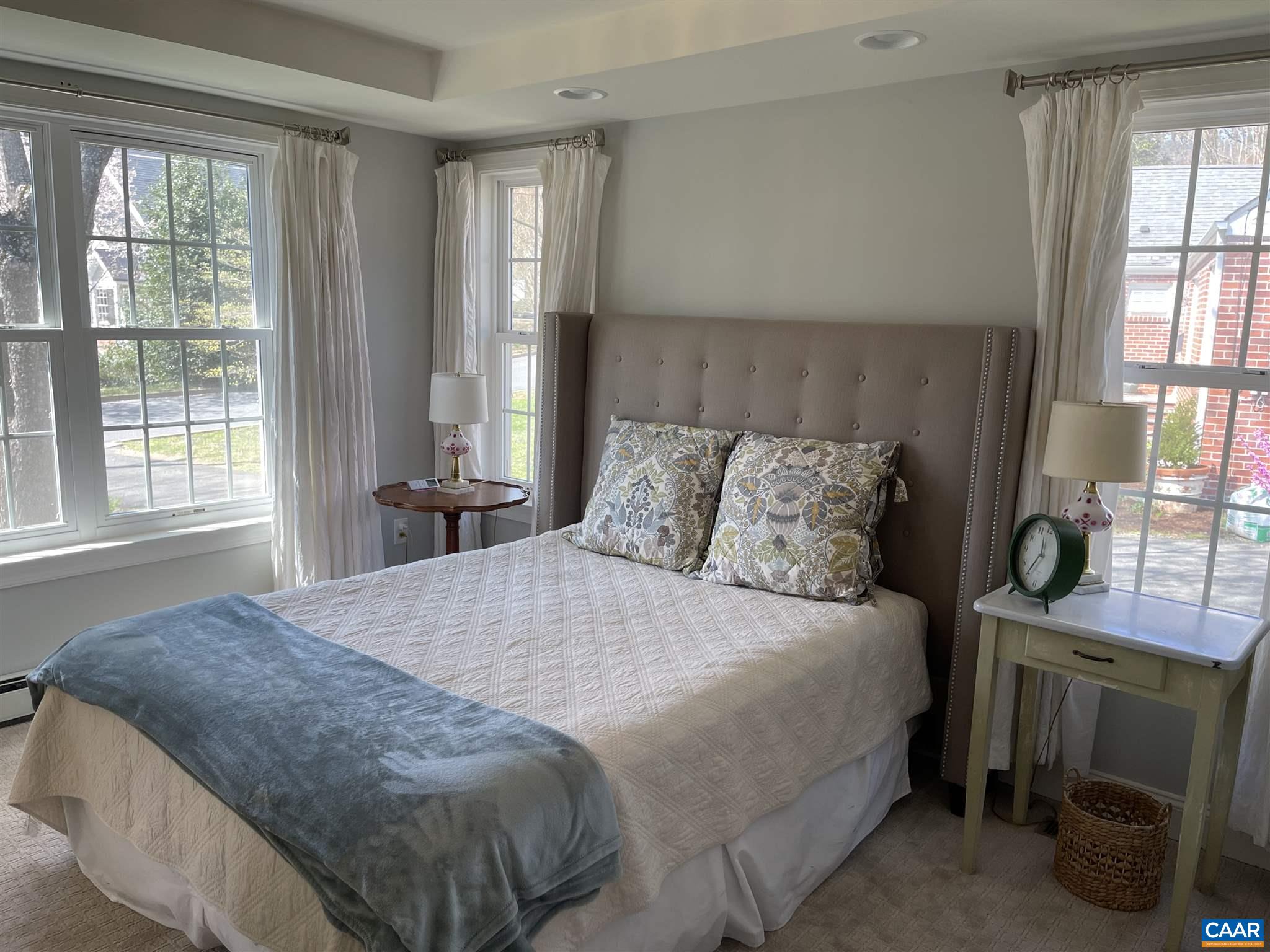1953 Thomson Road Charlottesville, VA 22903 - Photo 6 of 7 a bedroom with a bed and a window