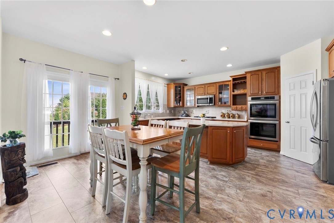 753 Blossom Tree Road Culpeper, VA 22701 - Photo 23 of 68 Spacious kitchen featuring warm wood cabinetry, li