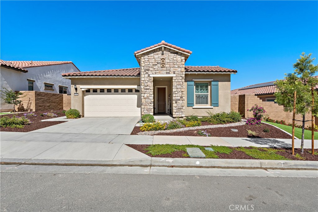 24301 Overlook Drive Corona, CA 92883 - Photo 1 of 20 front view of a house with a yard
