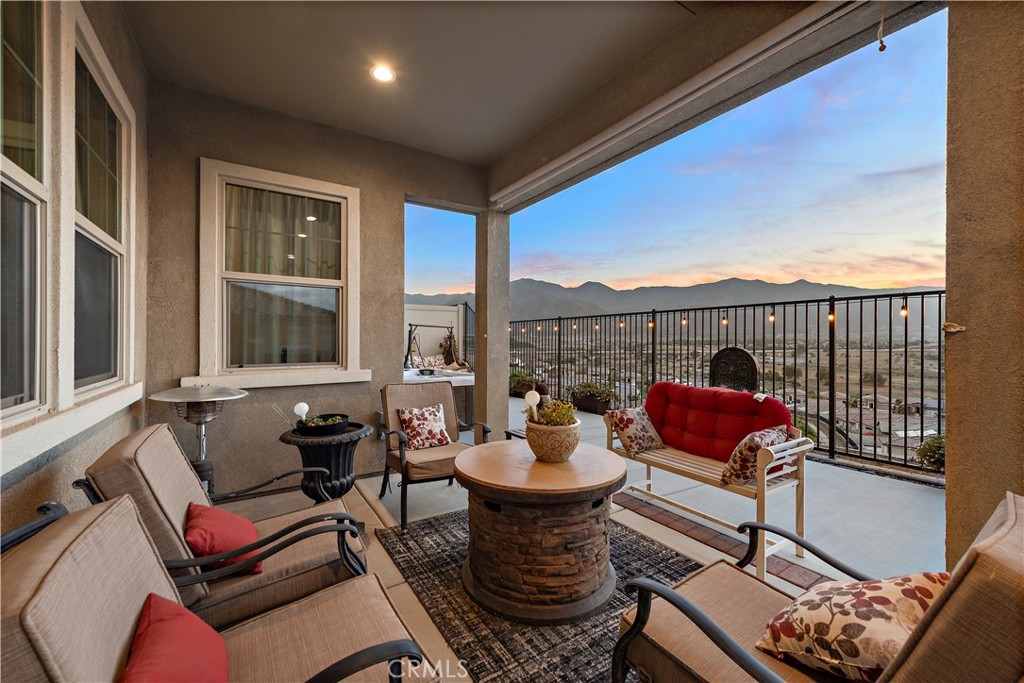 24301 Overlook Drive Corona, CA 92883 - Photo 20 of 20 a outdoor living space with furniture and a floor to ceiling window