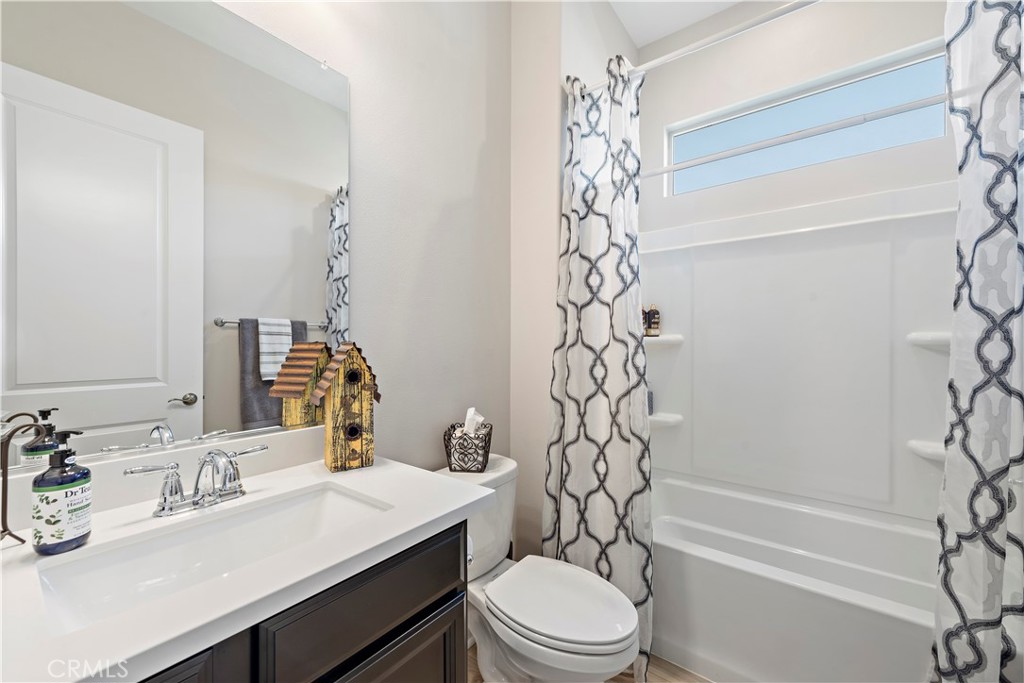 24301 Overlook Drive Corona, CA 92883 - Photo 4 of 20 a bathroom with a sink toilet vanity tub and shower