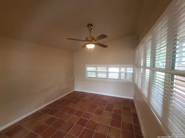 a view of an empty room and window