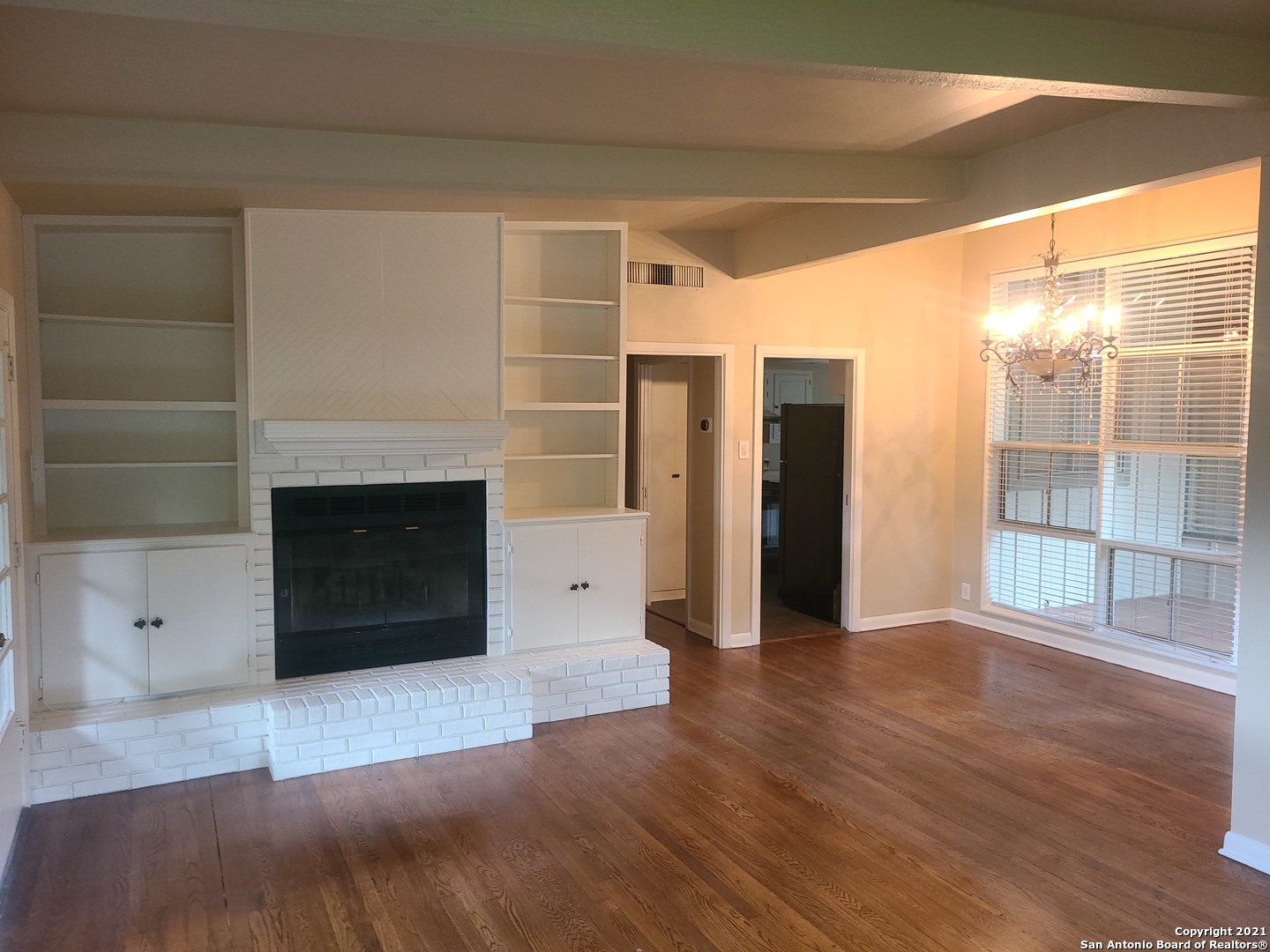 106 Ridgehaven Place San Antonio, TX 78209 - Photo 3 of 22 a view of a livingroom with a fireplace and window