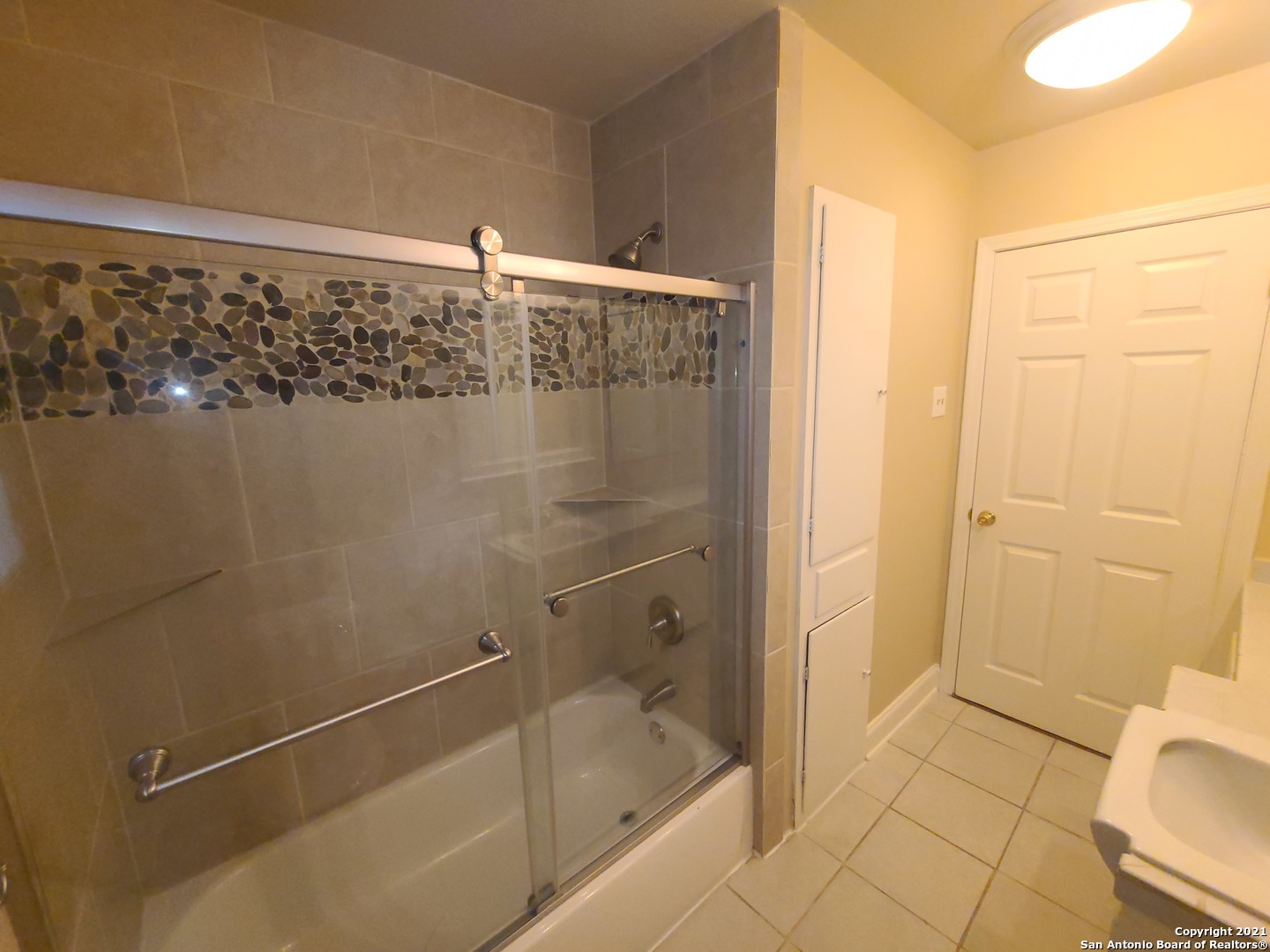 106 Ridgehaven Place San Antonio, TX 78209 - Photo 10 of 22 a bathroom with a shower and a sink