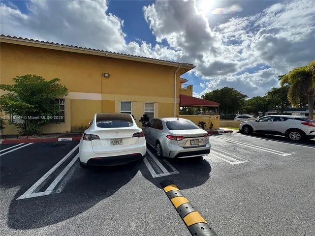 a car parked in front of a house