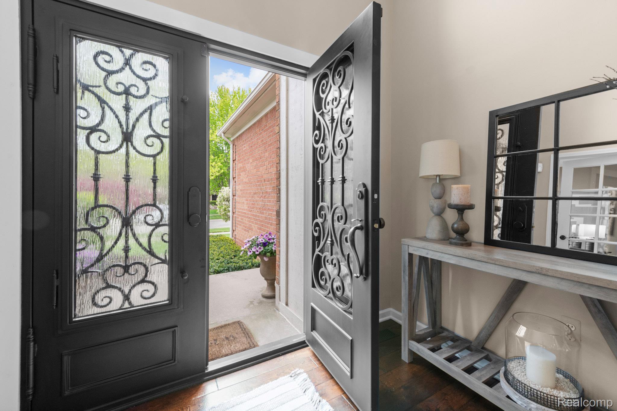 1476 Werth Drive Rochester, MI 48306 - Photo 5 of 55 Elegant entry with double wrought iron and frosted glass doors