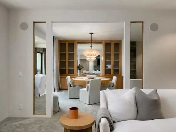 a view of a dining room with furniture window and outside view