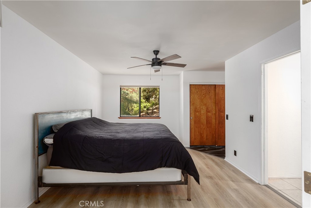 3175 Arena Avenue Atascadero, CA 93422 - Photo 13 of 40 a bedroom with a bed and a window