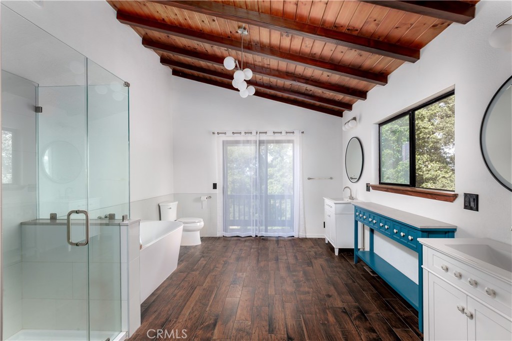 3175 Arena Avenue Atascadero, CA 93422 - Photo 15 of 40 a bathroom with a sink a mirror and a shower