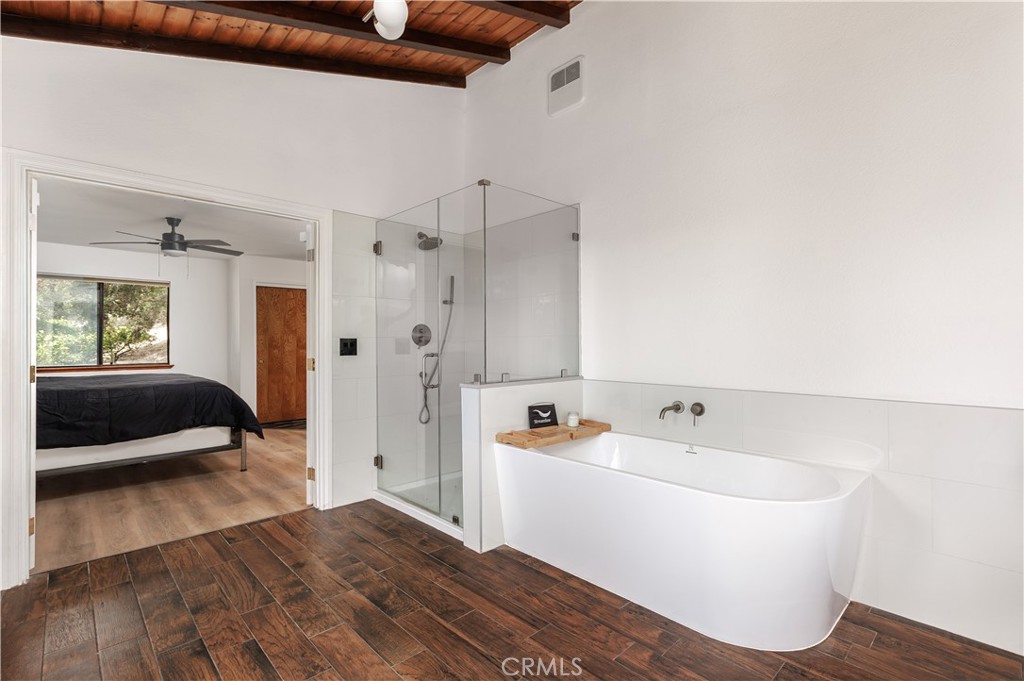 3175 Arena Avenue Atascadero, CA 93422 - Photo 16 of 40 a bathroom with a tub and a shower