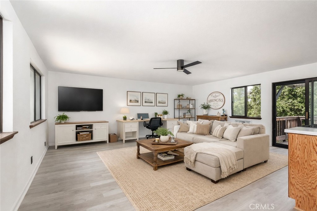 3175 Arena Avenue Atascadero, CA 93422 - Photo 19 of 40 a living room with furniture and a flat screen tv