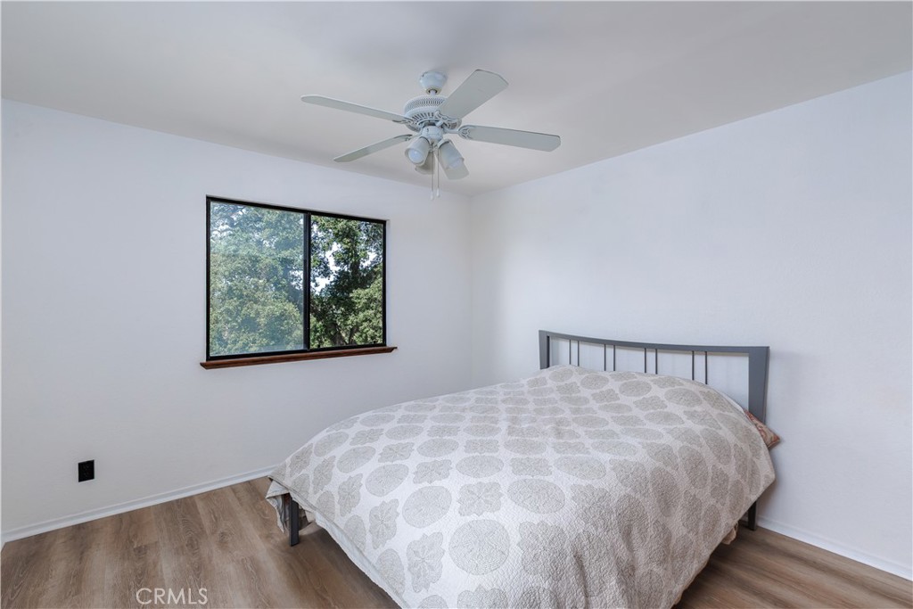 3175 Arena Avenue Atascadero, CA 93422 - Photo 22 of 40 a bedroom with a bed and window