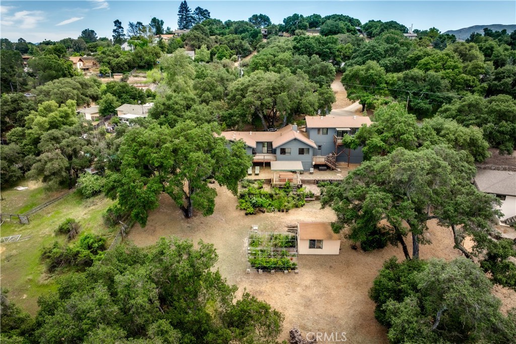 3175 Arena Avenue Atascadero, CA 93422 - Photo 4 of 40 an aerial view of a house with yard and outdoor seating