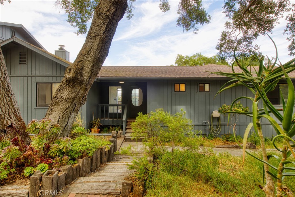 3175 Arena Avenue Atascadero, CA 93422 - Photo 5 of 40 a front view of a house with garden