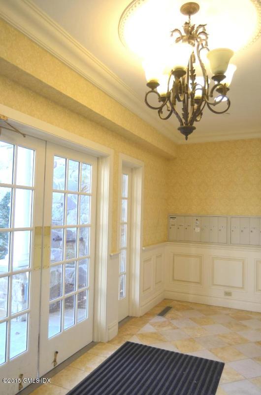 2 Dearfield Drive, Unit 2B Greenwich, CT 06831 - Photo 3 of 13 a view of an empty room with a window