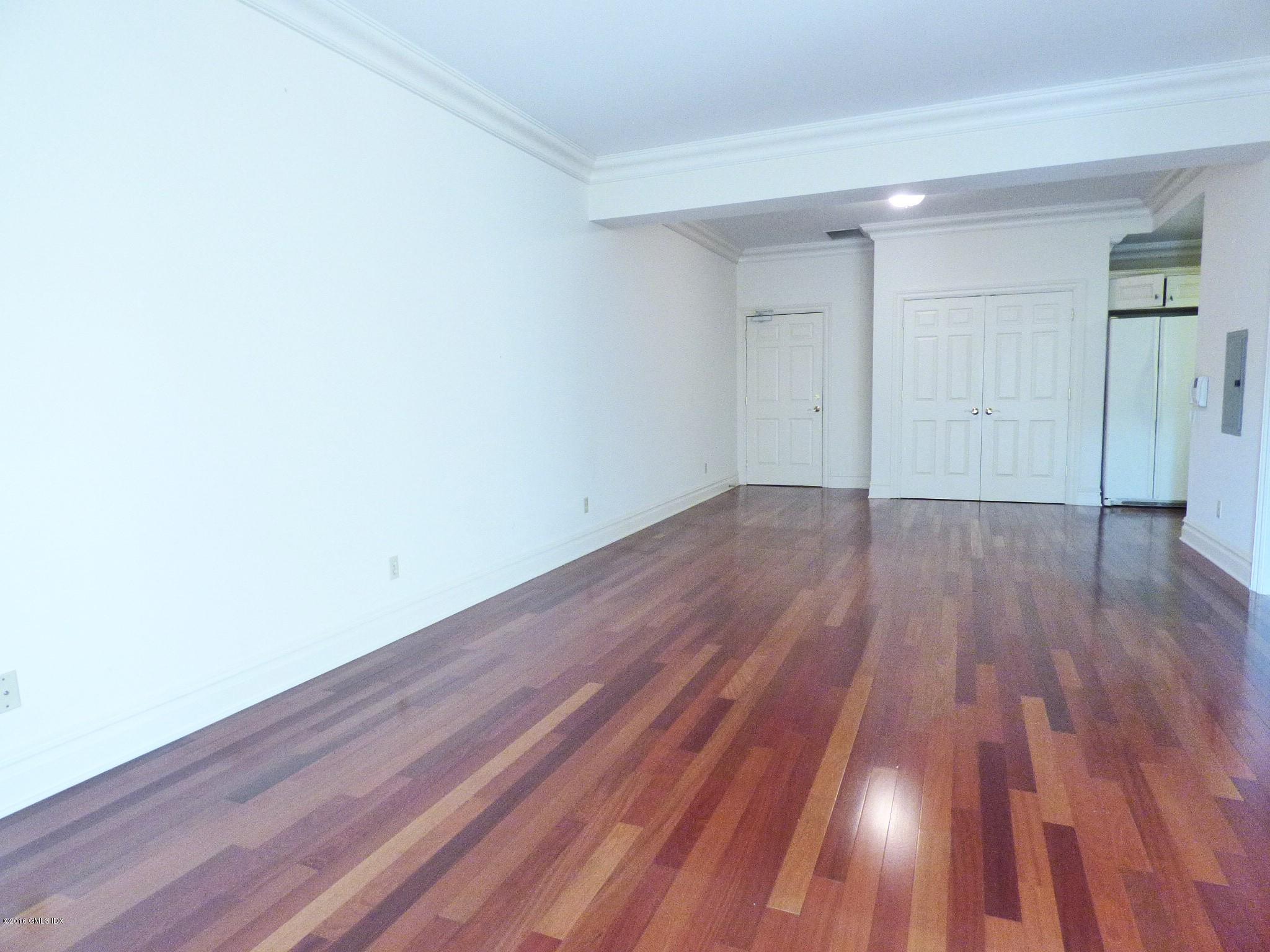 2 Dearfield Drive, Unit 2B Greenwich, CT 06831 - Photo 7 of 13 a view of wooden floor in a room