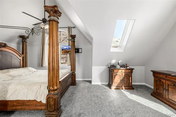 a bathroom with a sink and a mirror with bathtub