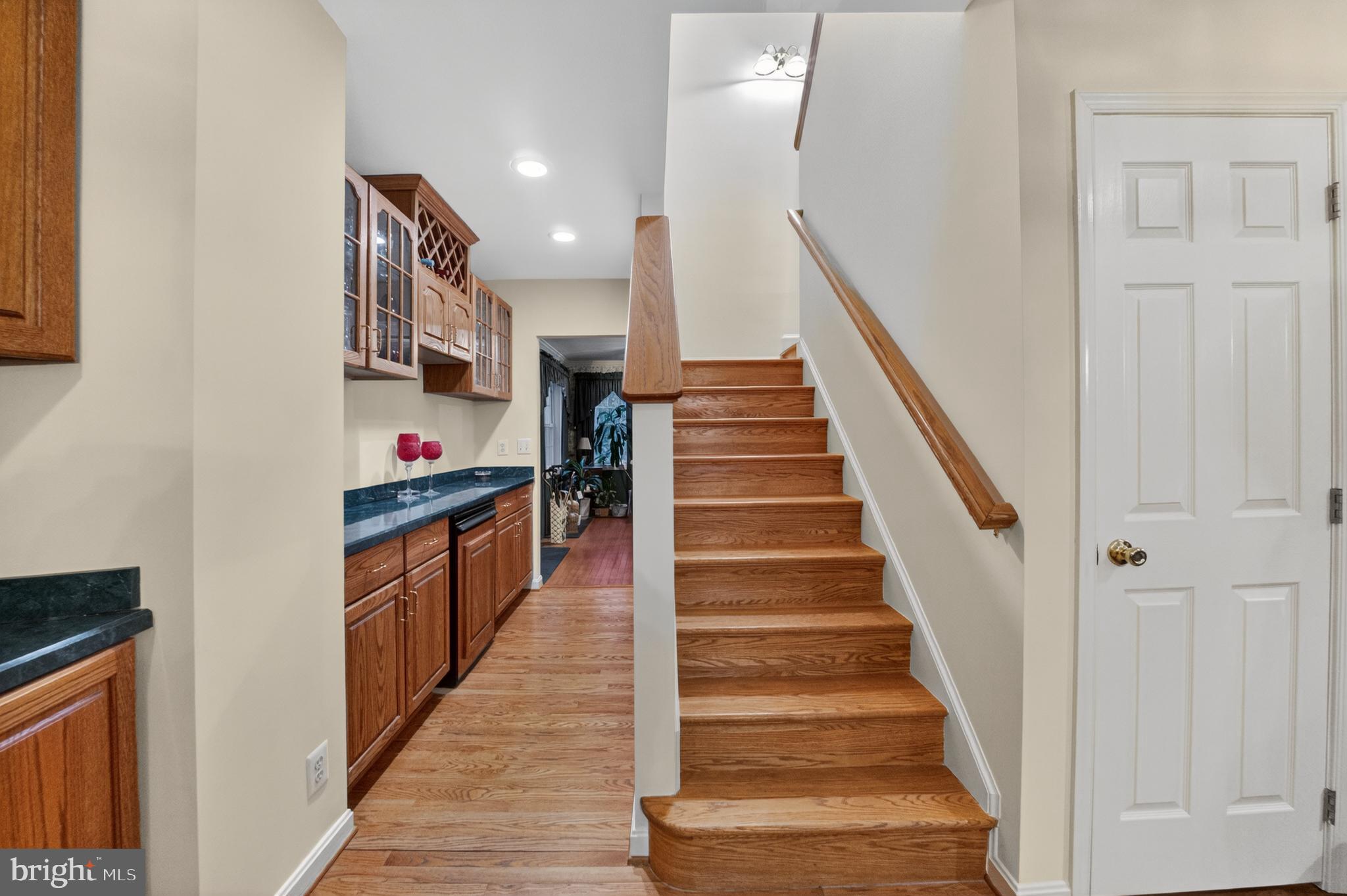 2701 Olney Sandy Spring Road Olney, MD 20832 - Photo 11 of 48 a view of entryway and hall with wooden floor
