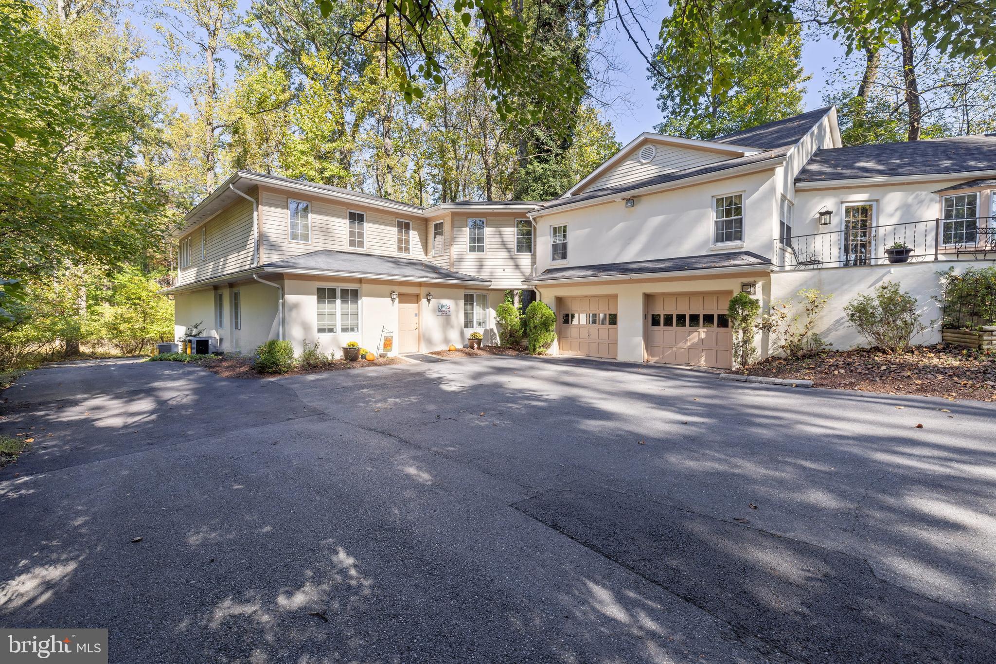 2701 Olney Sandy Spring Road Olney, MD 20832 - Photo 2 of 48 a front view of a house with a yard