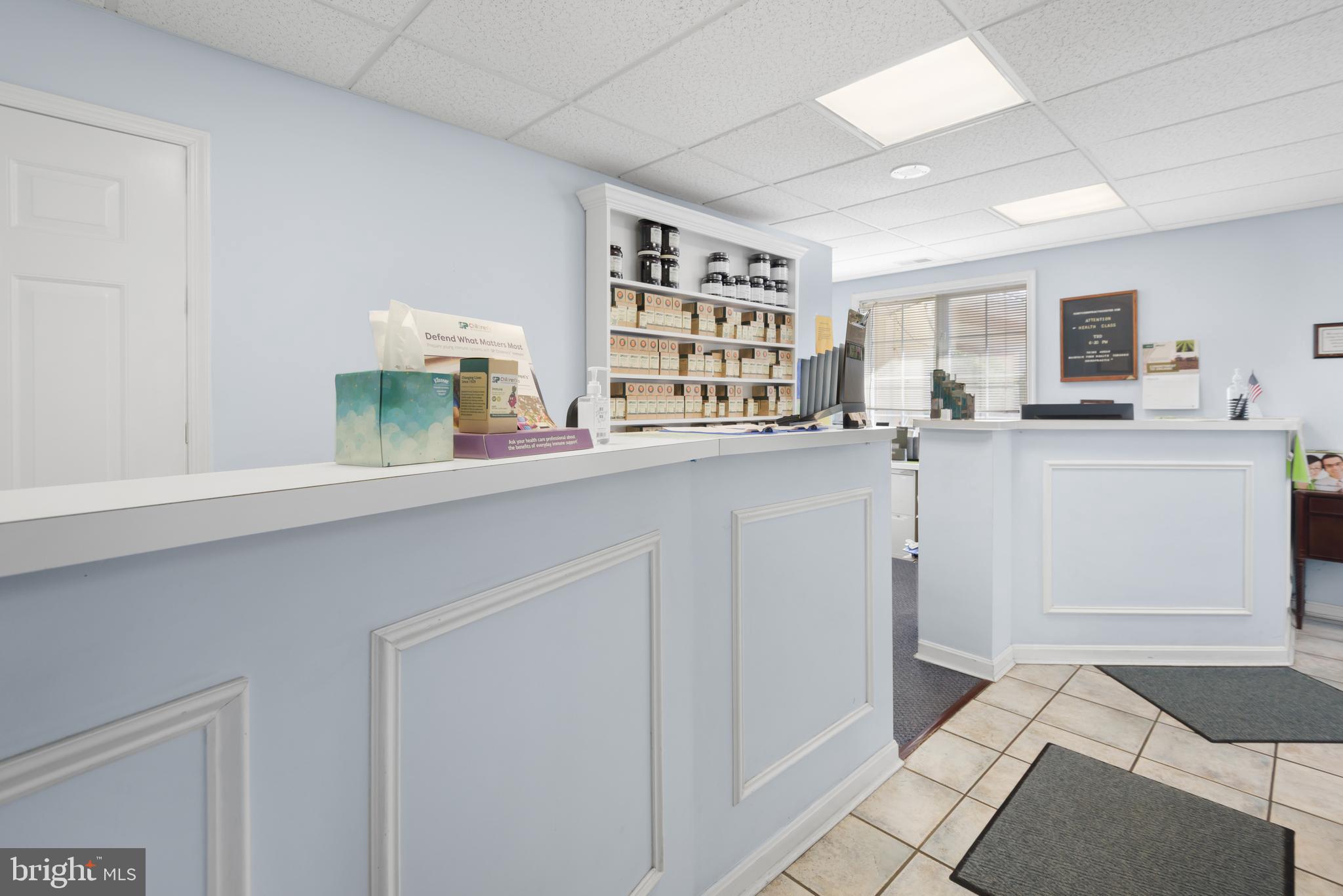 2701 Olney Sandy Spring Road Olney, MD 20832 - Photo 39 of 48 Large reception desk