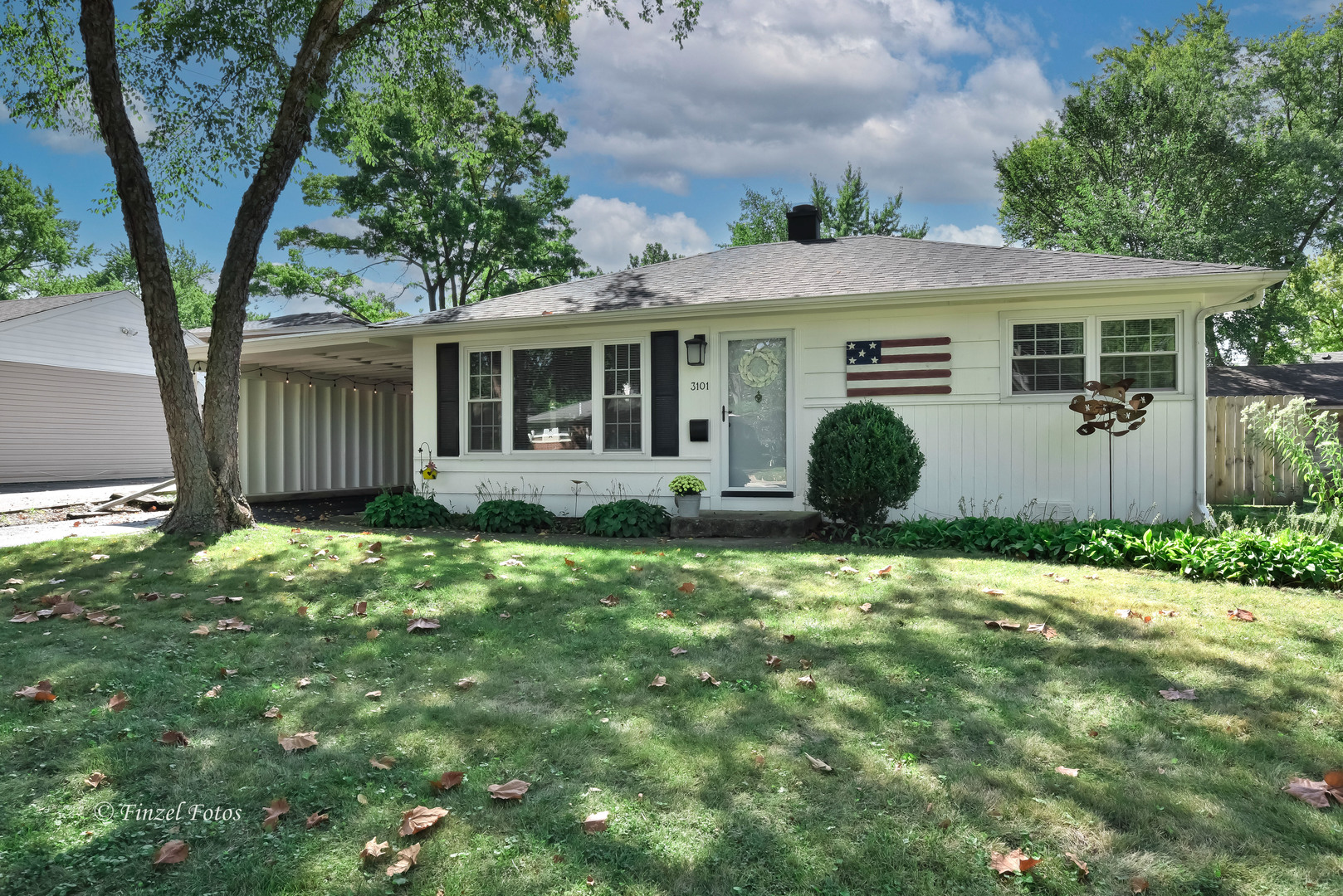 3101 Thrush Lane Rolling Meadows, IL 60008 - Photo 1 of 16 a front view of a house with garden