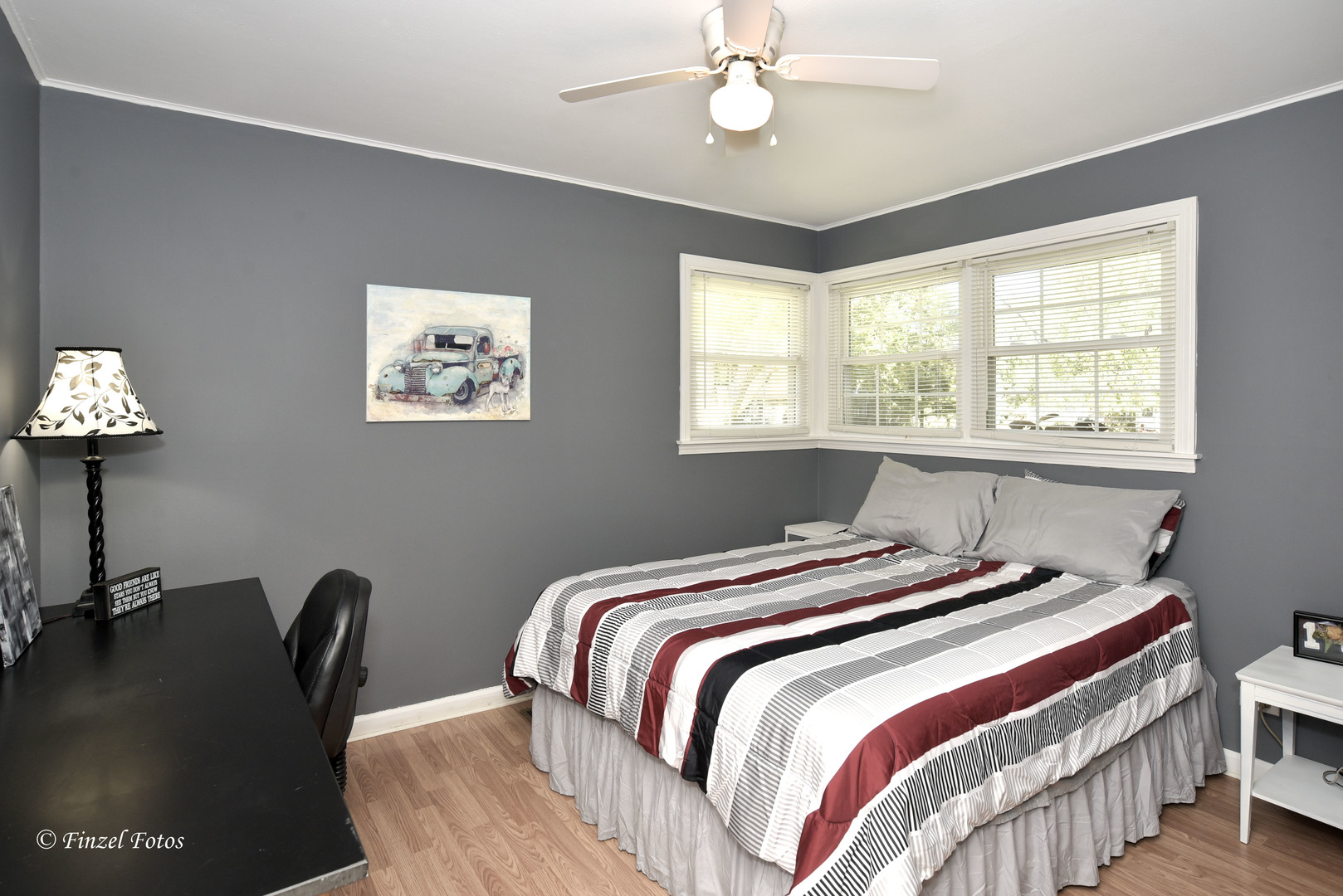 3101 Thrush Lane Rolling Meadows, IL 60008 - Photo 8 of 16 a bedroom with a bed and a desk