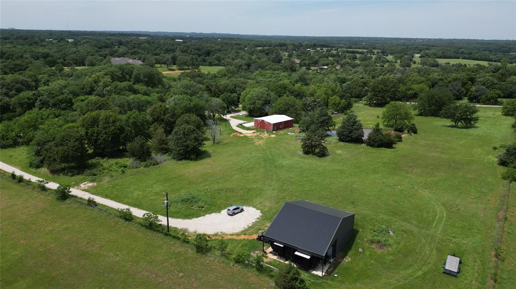 3318 Desvoignes Road Denison, TX 75021 - Photo 1 of 3 an aerial view of a house with pool big yard and outdoor seating