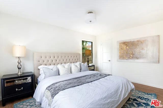 a bathroom with a bathtub and a sink