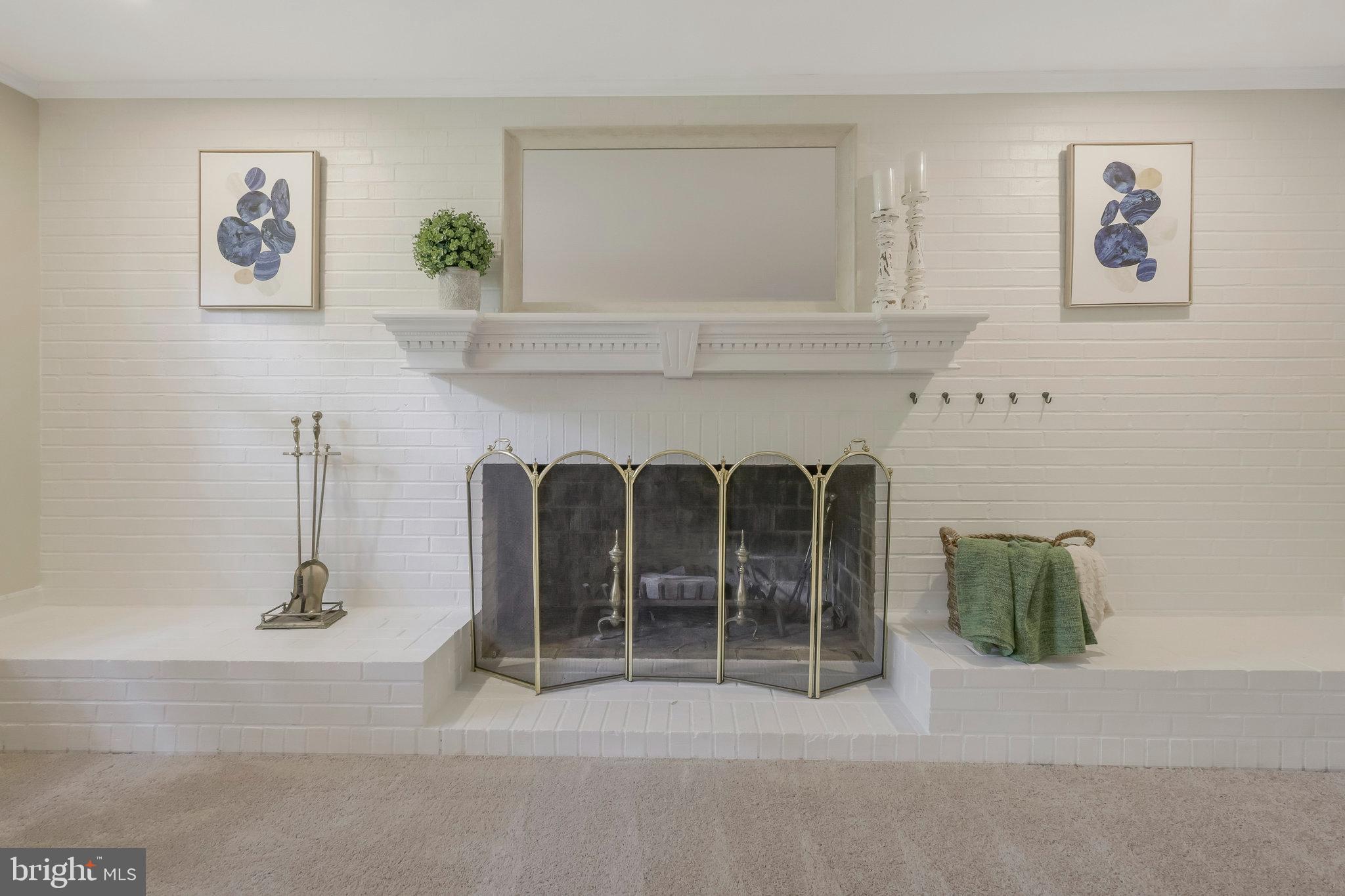 6713 Caneel Court Springfield, VA 22152 - Photo 30 of 44 Lower Level Family Room Wood Fireplace