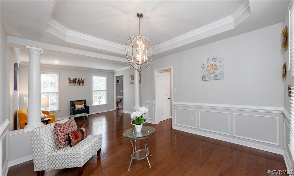 5208 Wheat Ridge Place Glen Allen, VA 23059 - Photo 11 of 45 a living room with furniture and a chandelier