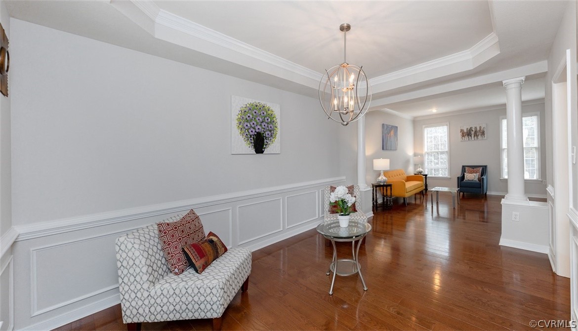 5208 Wheat Ridge Place Glen Allen, VA 23059 - Photo 12 of 45 a living room with furniture and a chandelier
